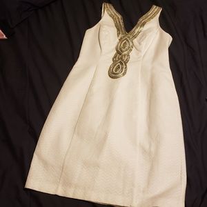 White cocktail dress with metallic trim